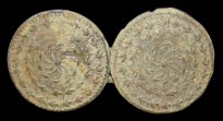 Cast copper alloy buttons with a pinwheel-like floral motif. The center flower is surrounded by emanating rays and two rings of leaves - click on image to see larger view.